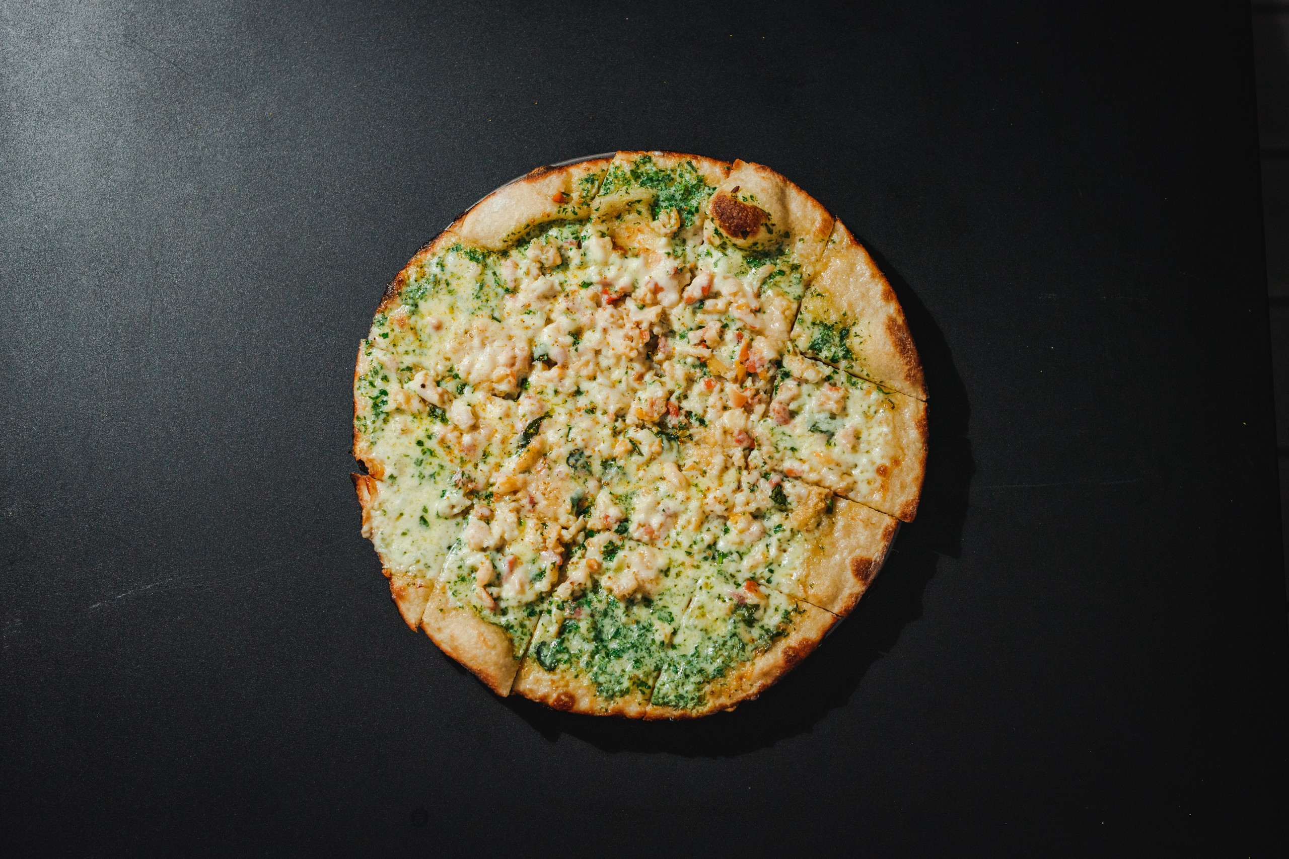 Nighthawk Pizza Brings ThinCrust Pies and LowABV Beers to Arlington